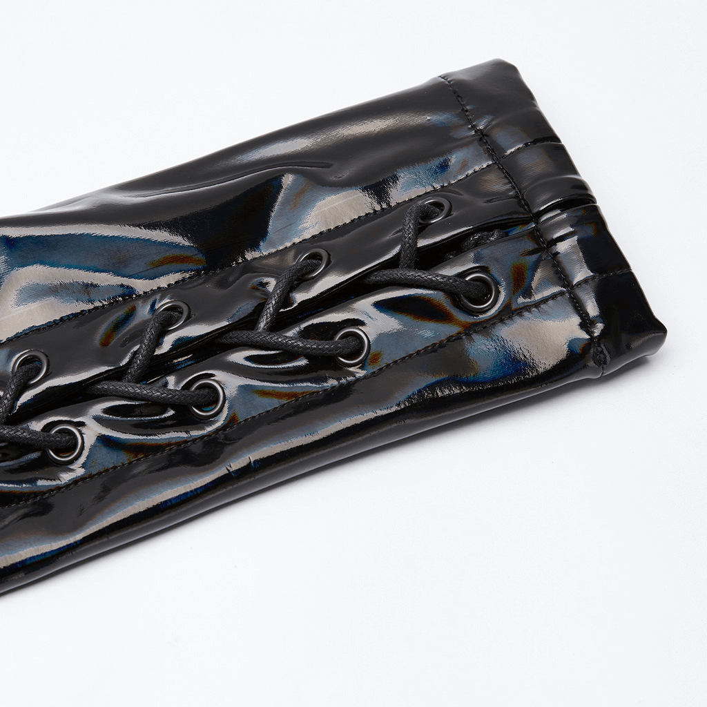 Close-up of a black high-shine laser-cut sleeve featuring intricate lacing details, perfect for avant-garde fashion.