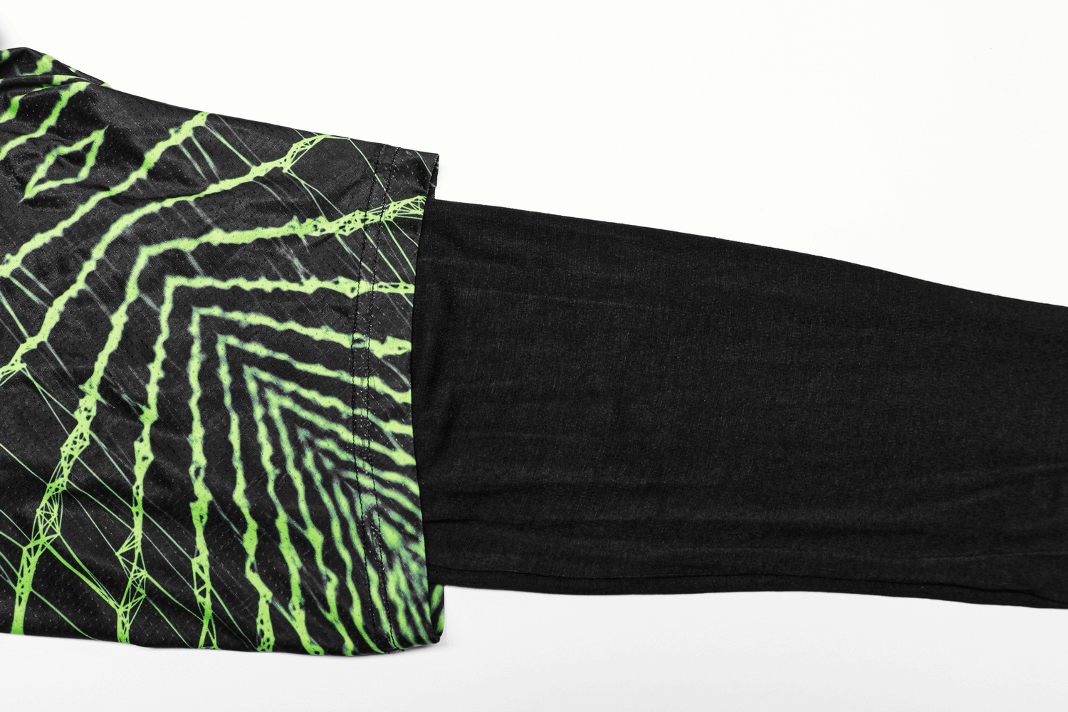 Futuristic geometric print harem pants in neon green and black, showcasing a stylish elastic waist design.