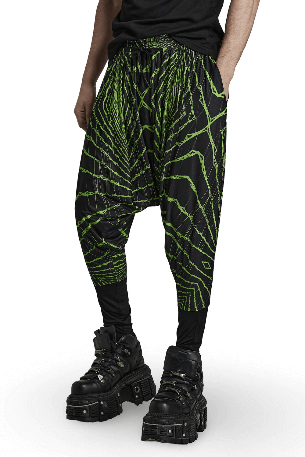 Futuristic geometric print harem pants with elastic waist, styled with edgy chunky boots.