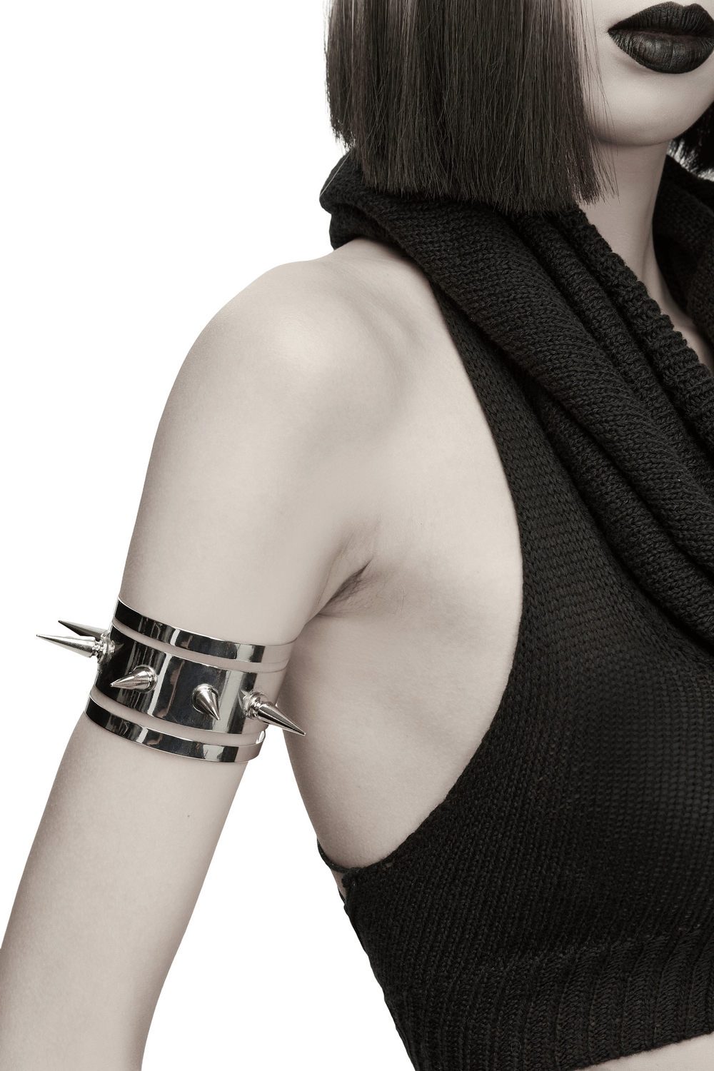 Futuristic Punk Spiked Arm Cuff with Mirror Finish showcased on a model's arm, featuring bold spikes and shiny design.