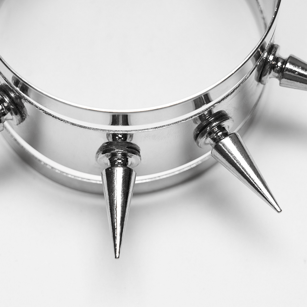 Futuristic Punk Spiked Arm Cuff with Mirror Finish showcasing bold metallic spikes and sleek design.