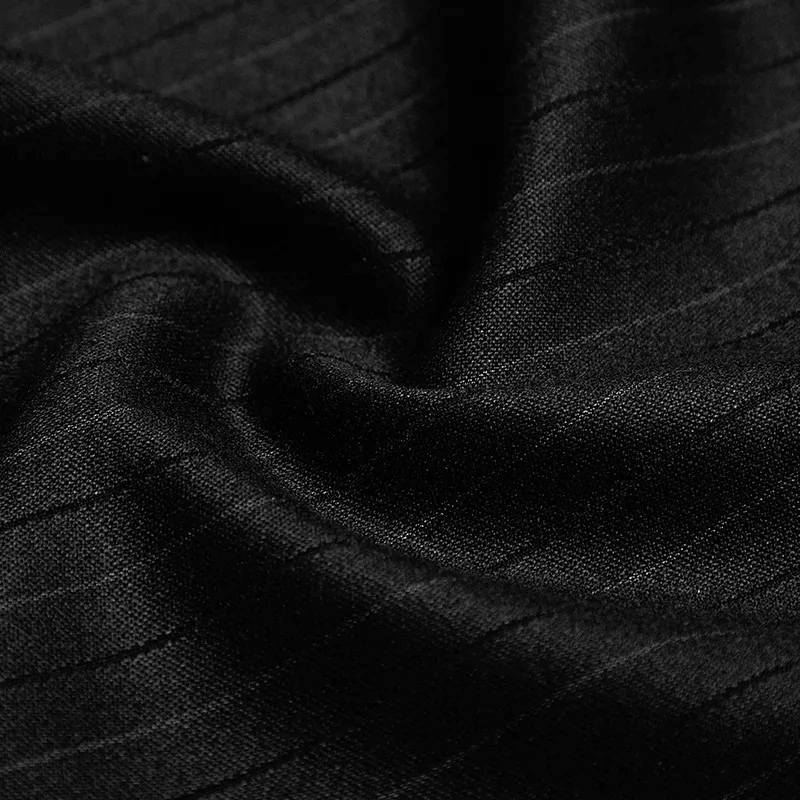 Close-up of smooth black fabric with subtle striped pattern, perfect for elegant steampunk pants.