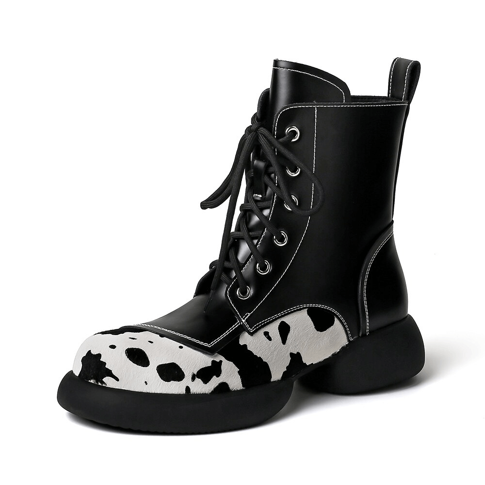 Fashion round-toe genuine leather ankle boots for women in cow print with lace-up design.