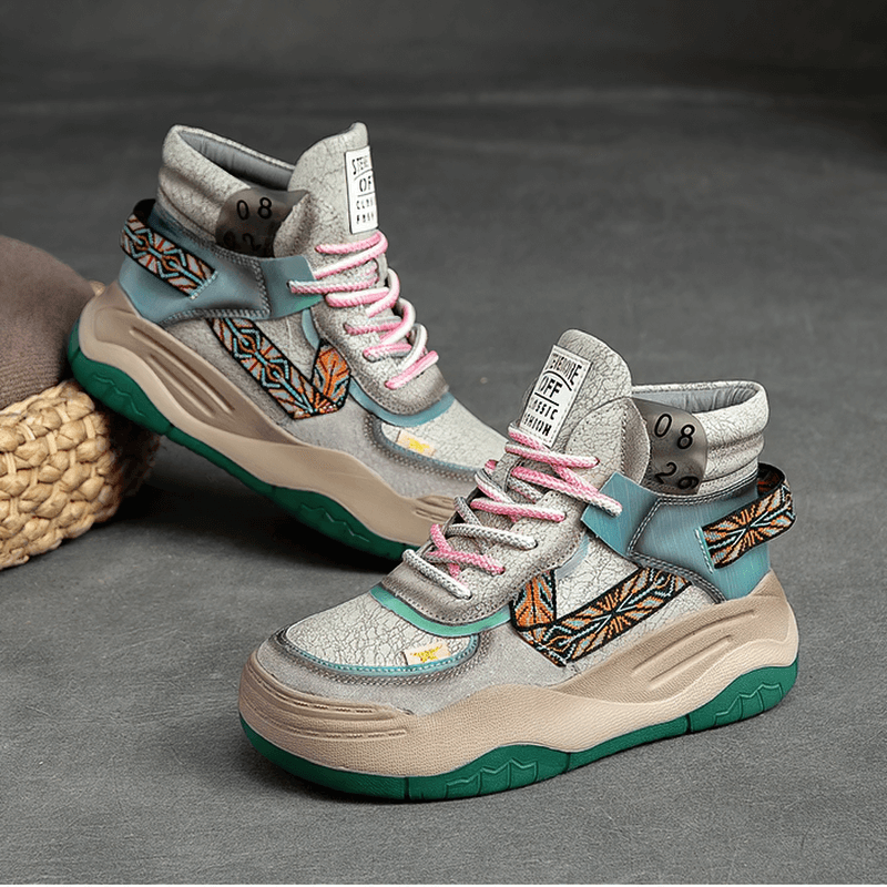 Stylish women's genuine leather patchwork lace-up platform boots in unique patterns and colors.