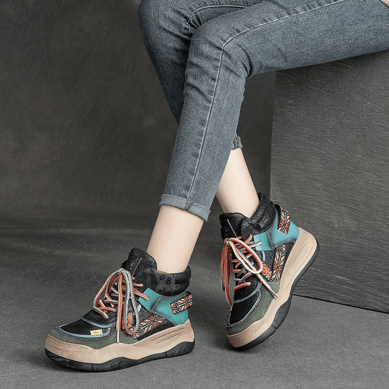 Genuine leather women's high sole patchwork boots with lace-up design, perfect for trendy alternative style.