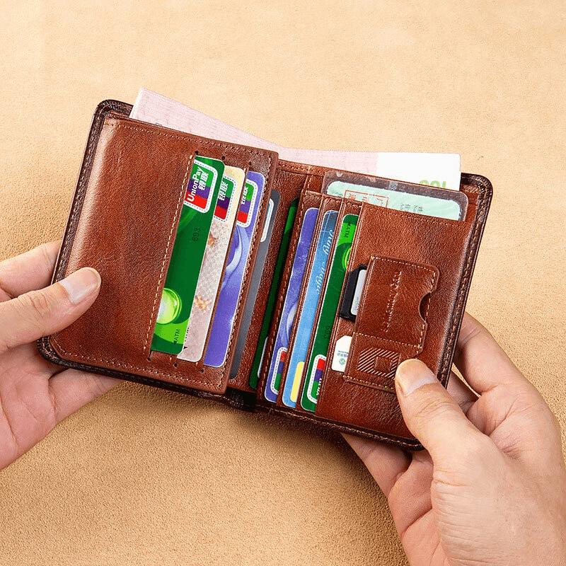 Genuine leather wallet opened, showcasing card slots and pockets, perfect for luxury style and functionality.