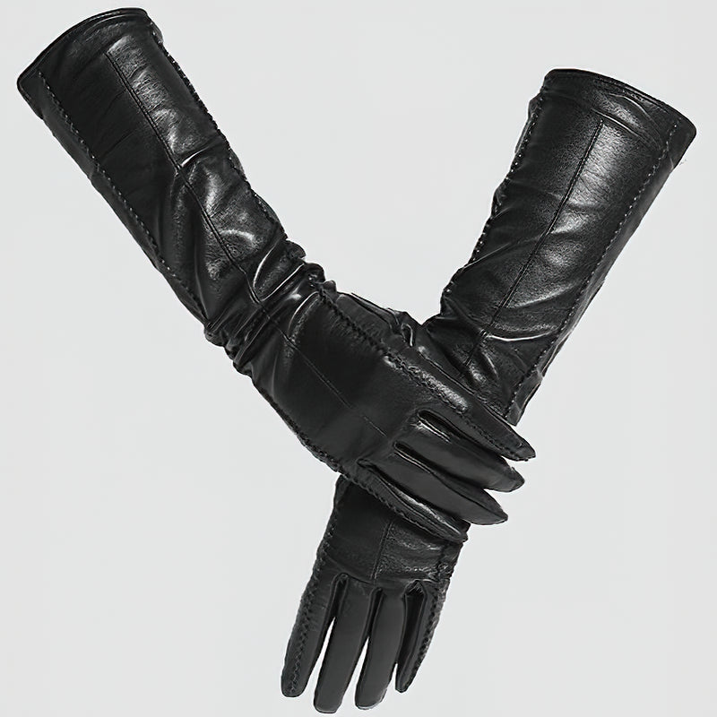 Long black genuine sheepskin women's gloves, perfect for vintage-style outfits and winter fashion.