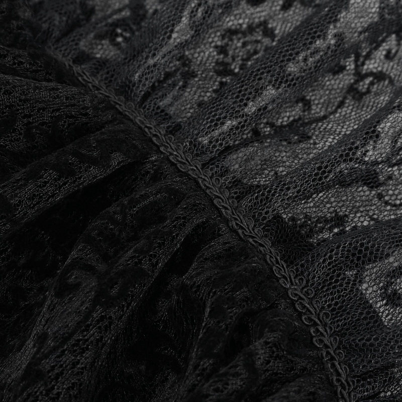 Close-up of exquisite black lace detail on a gothic men's stand collar shirt, showcasing fine mesh and texture.