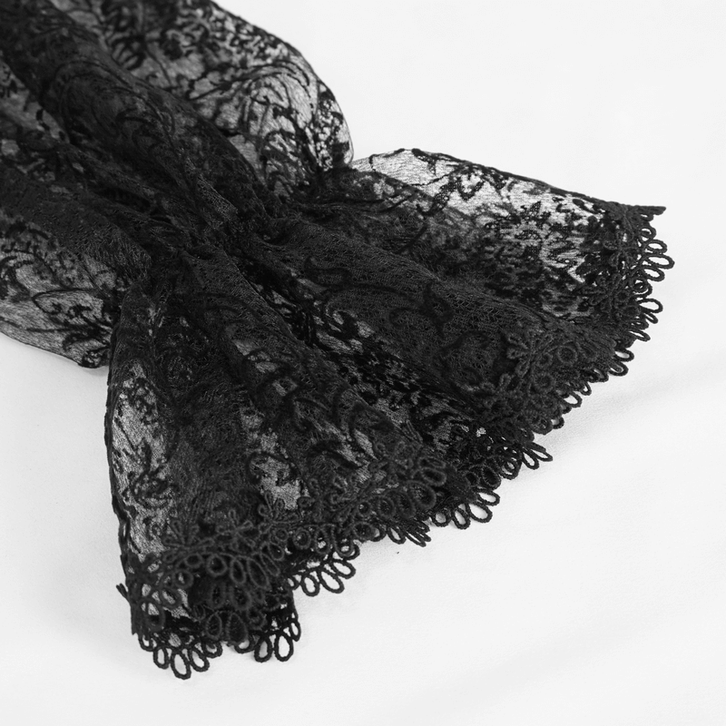 Elegant black lace fabric with intricate detailing and ruffled edges, perfect for a gothic-style shirt.