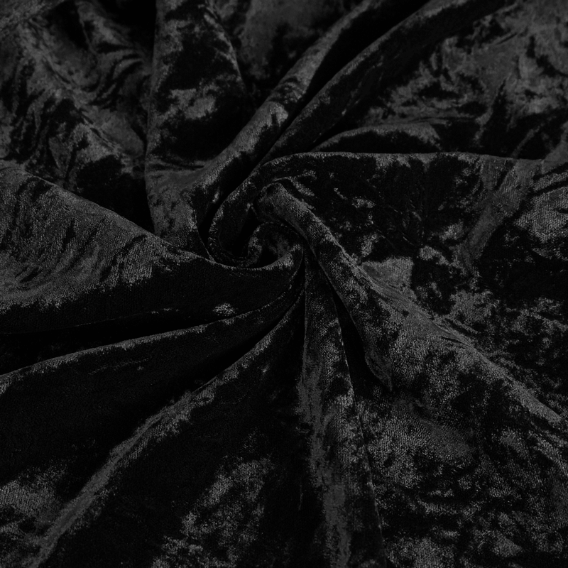 Close-up of luxurious black velvet fabric, perfect for gothic fashion and elegant attire.