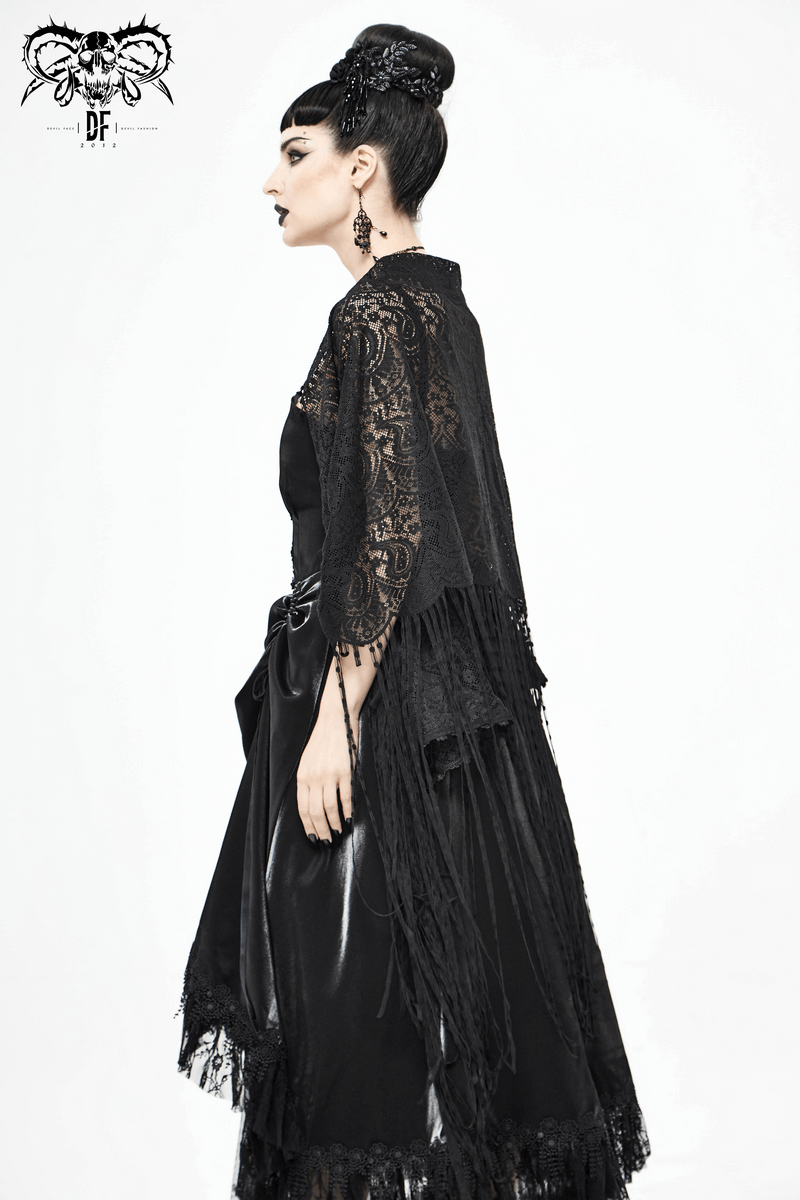 Model wearing a stunning black lace tassel cape, showcasing gothic elegance and vintage charm.