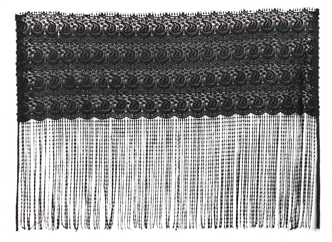 Elegant black lace fabric with fringes, perfect for crafting gothic capes and vintage clothing accessories.