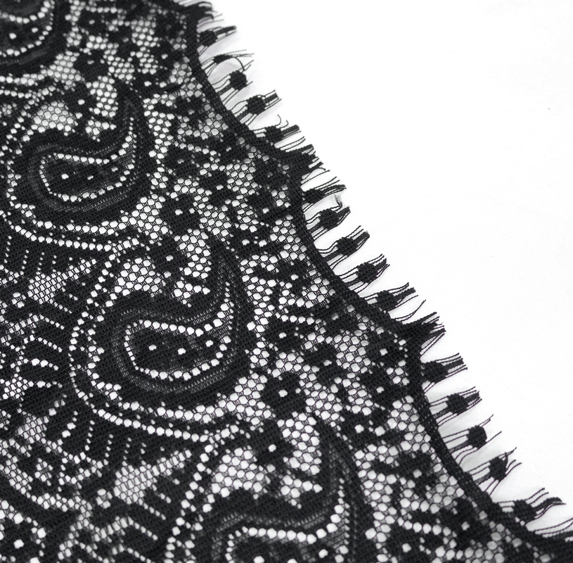 Elegant black lace detail with fringe, perfect for gothic capes and stylish women's accessories.