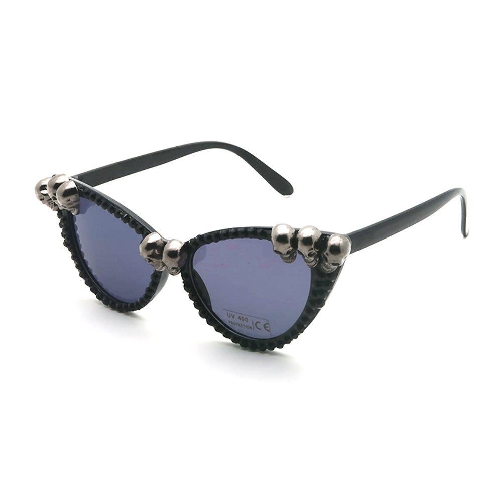 Gorgeous women's black cat-eye sunglasses with skull rhinestones, trendy gothic accessory for stylish looks.