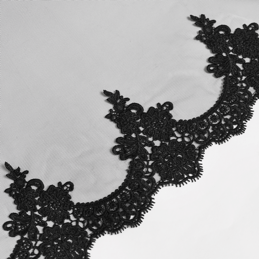 Close-up of ornate black lace edging, perfect for a Goth Bat Wing Lace Veil Headpiece with Purple Roses.