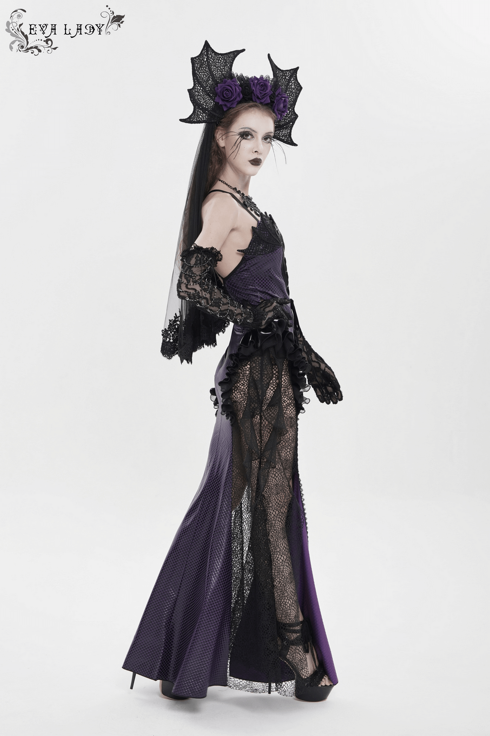 Goth Bat Wing Lace Veil Headpiece with Purple Roses worn by model in elegant purple and black outfit.