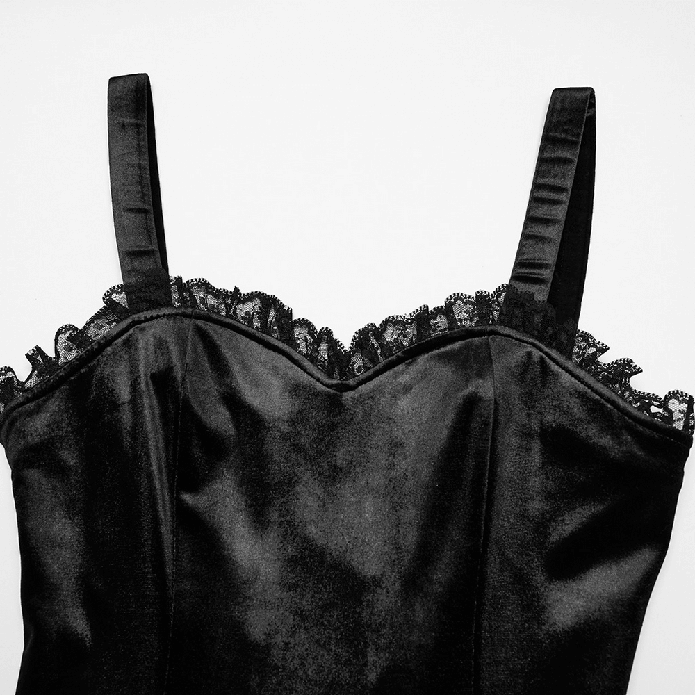 Close-up of the lace and satin straps on a goth black velvet dress with ruffled hem, showcasing elegant texture.