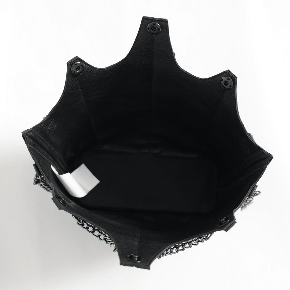 Inside view of the Goth Chain Shoulder Bag with Crown Silhouette Design showcasing its black faux leather finish.