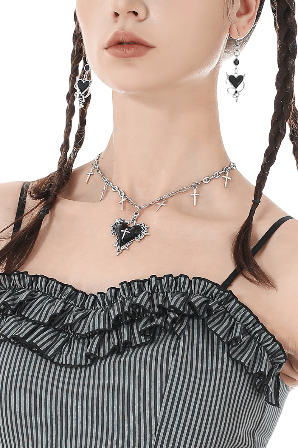 Goth Cross Charm Chain Necklace with Black Heart Pendant worn with matching earrings, showcasing a dark romantic style.