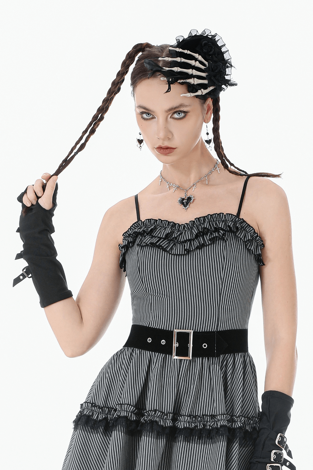 Goth Cross Charm Chain Necklace with Black Heart Pendant worn by model in gothic attire.