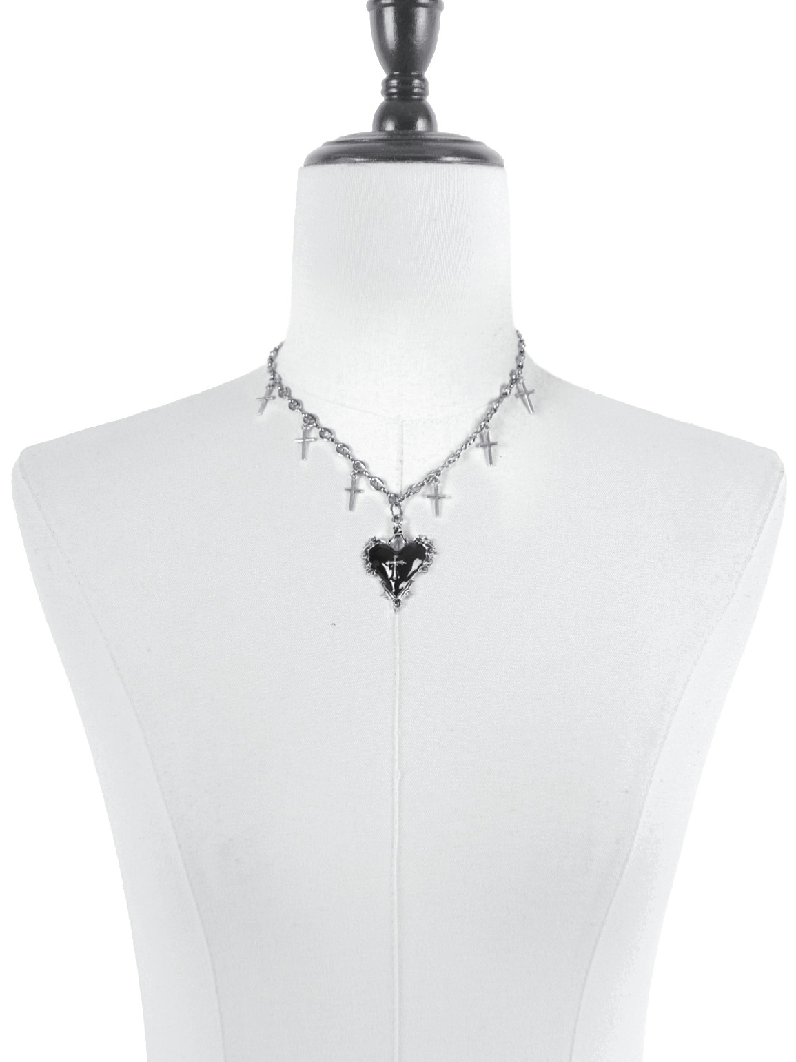 Goth Cross Charm Chain Necklace with Black Heart Pendant displayed on a mannequin, featuring cross charms and a black heart.