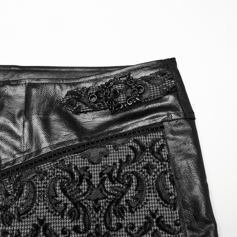 Close-up of goth embroidered lace pants showcasing intricate patterns and adjustable waist strap details.