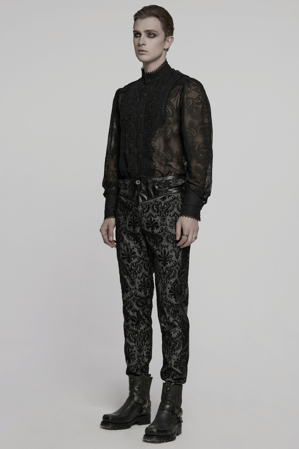 Goth embroidered lace pants with adjustable waist strap paired with a stylish sheer black shirt, perfect for a bold fashion statement.