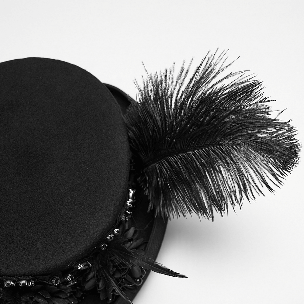 Goth Feather Floral Top Hat for Victorian Steampunk featuring bold feathers and floral trim, perfect for gothic and steampunk outfits.