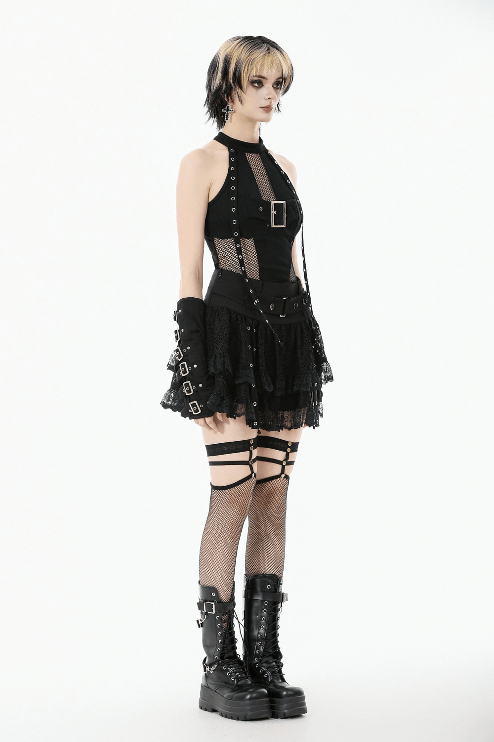 Goth Halter Crop Top with Mesh Panels and Buckle worn with a layered punk skirt and fishnet stockings, showcasing edgy style.
