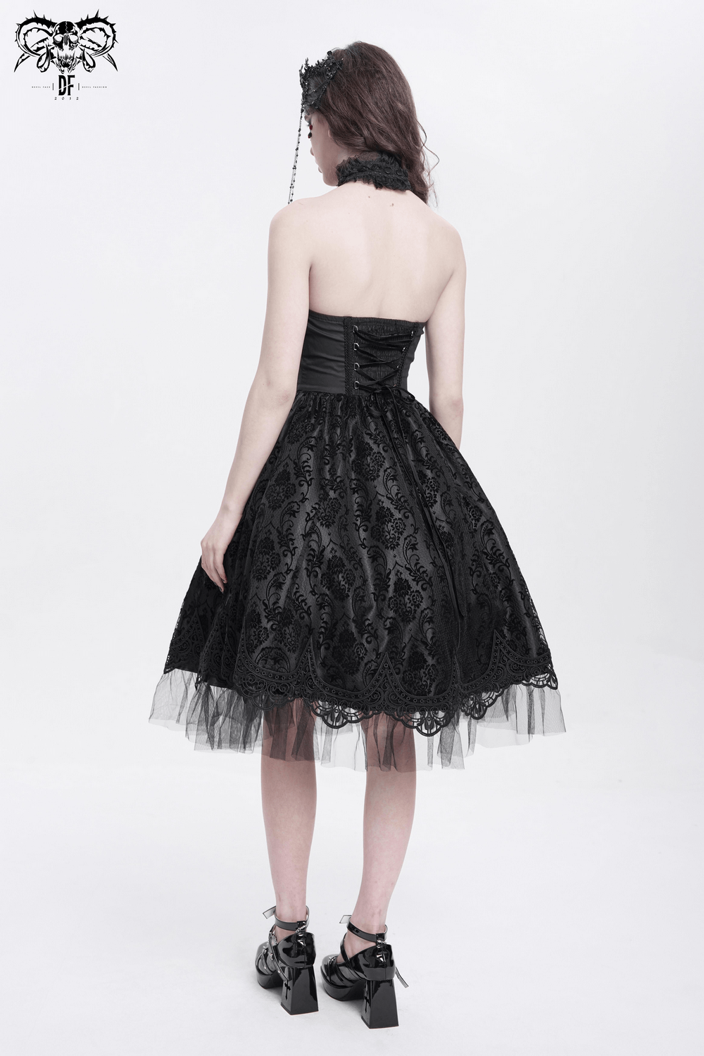 Back view of a gothic halter dress with lace overlay and tulle skirt, perfect for alternative fashion enthusiasts.