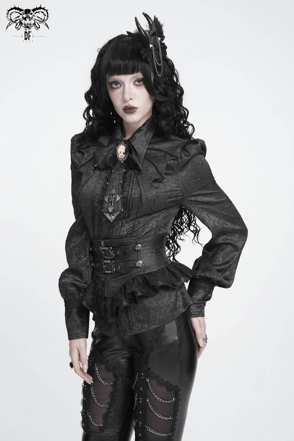 Goth Horn and Feather Brooch with Chain Accents styled on a model in dark, elegant gothic fashion.