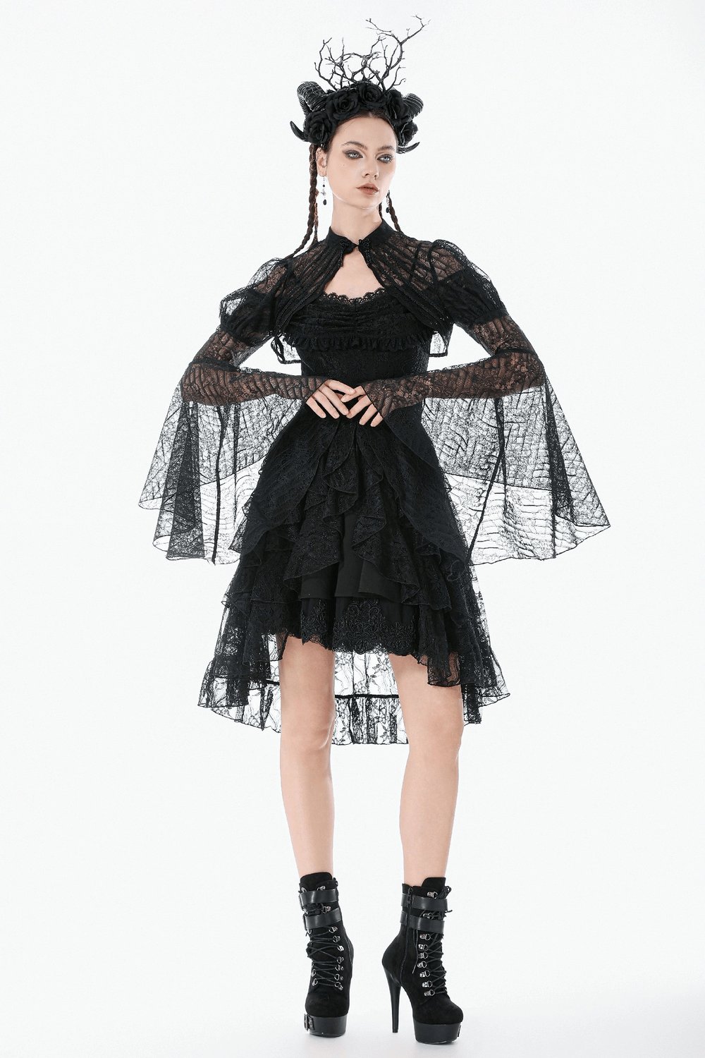 Goth Lace Bolero Shrug with Dramatic Long Bell Sleeves styled with a layered black dress and gothic accessories.