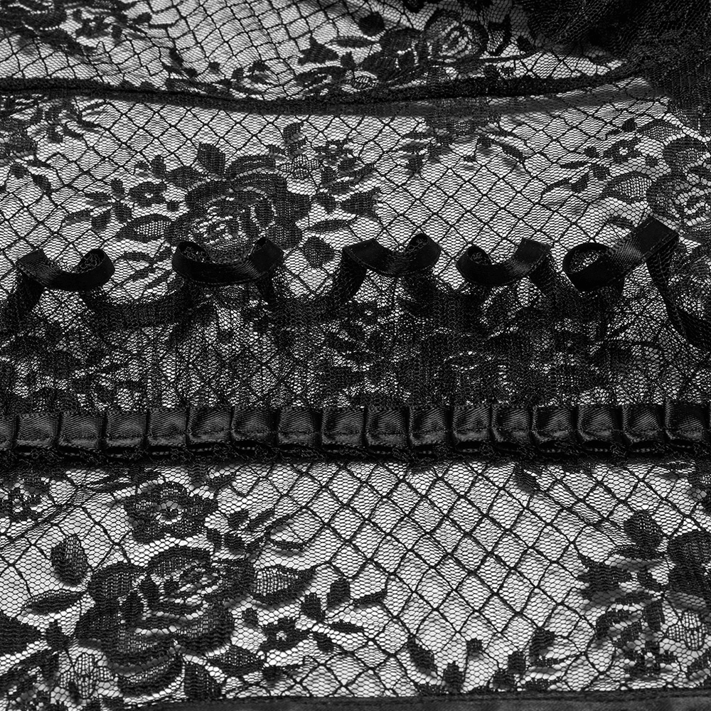 Close-up of black gothic lace with rose design and corset detail, perfect for a dramatic fashion statement.