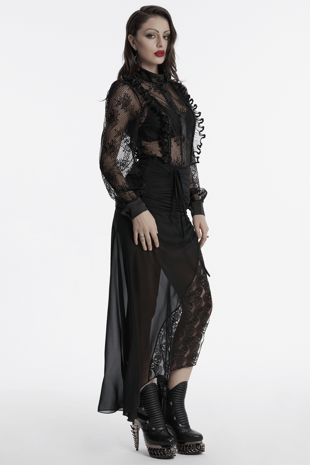 Gothic black lace blouse with transparent mesh, corset back detail, and rose design, styled with edgy boots.