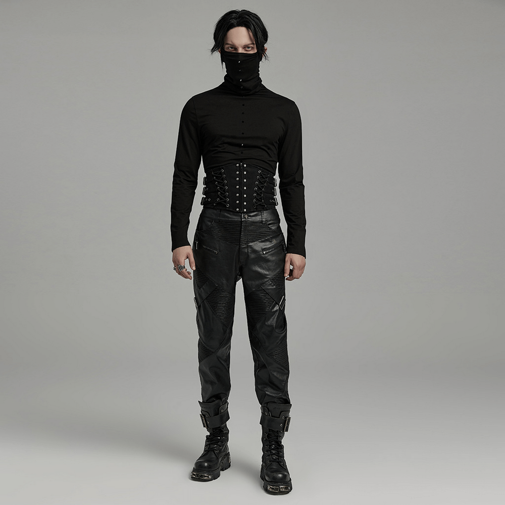 Punk male model in black lace-up corset belt and leather pants, showcasing a stylish waist-cinching look.