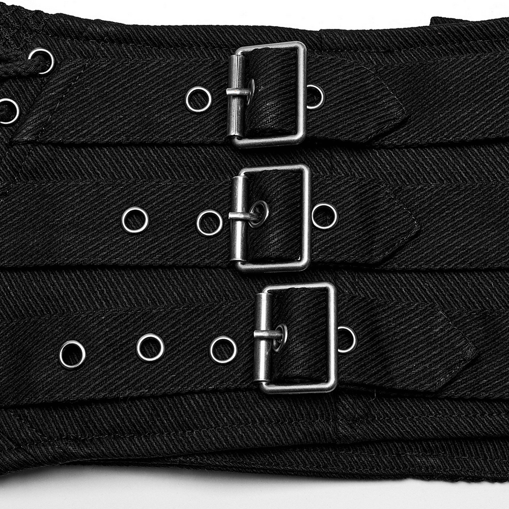 Close-up of a Goth lace-up corset belt with buckles and eyelets for a punk rock aesthetic.