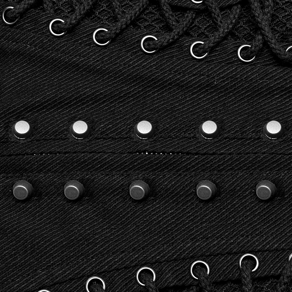 Close-up of black lace-up corset belt featuring metal studs and eyelets for a punk rock aesthetic.