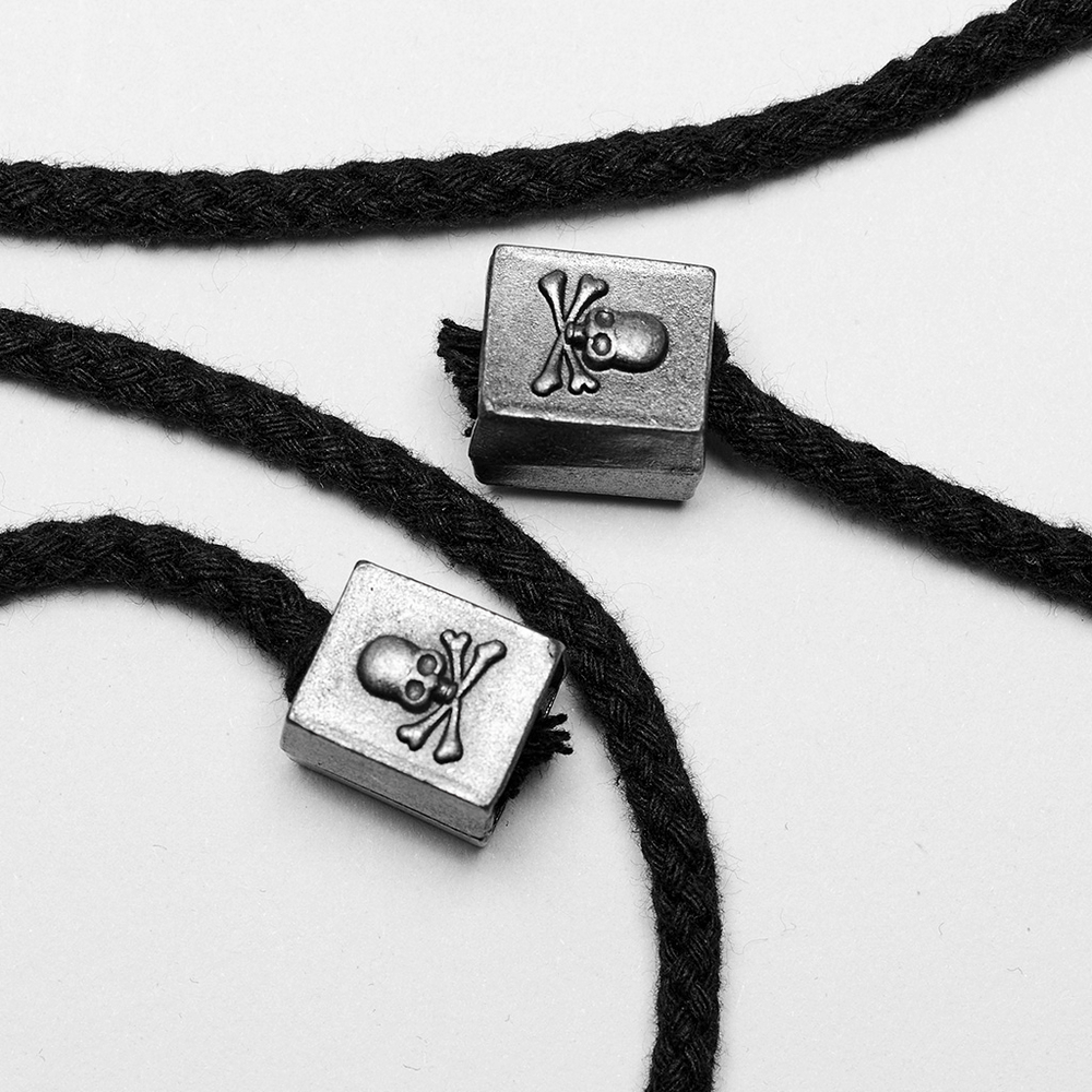 Black lace with skull and crossbones beads, perfect for punk fashion accessories.