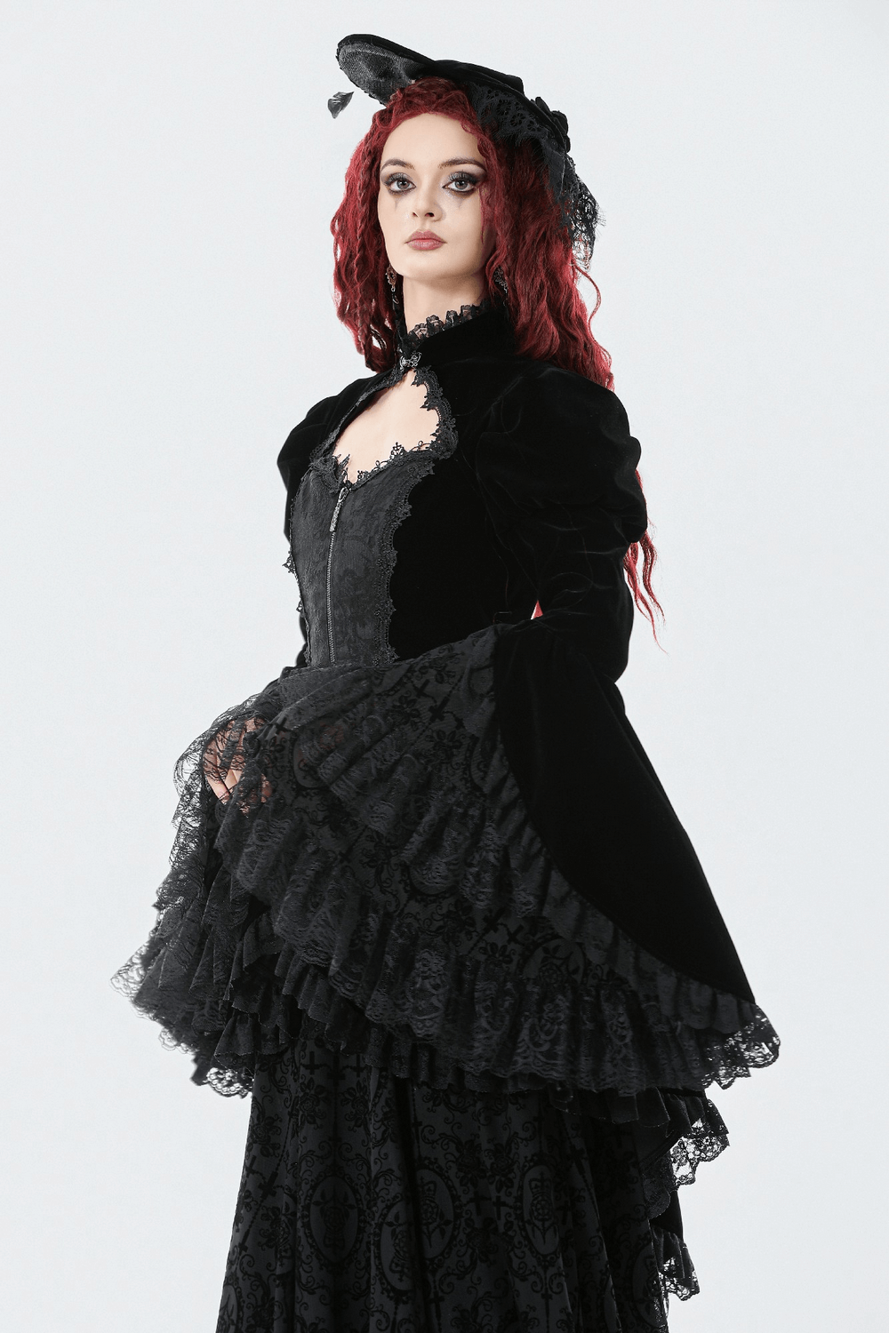 Goth Lace-Up Tiered High-Low Jacket with Bell Sleeves showcased on a model featuring lace and velvet details.