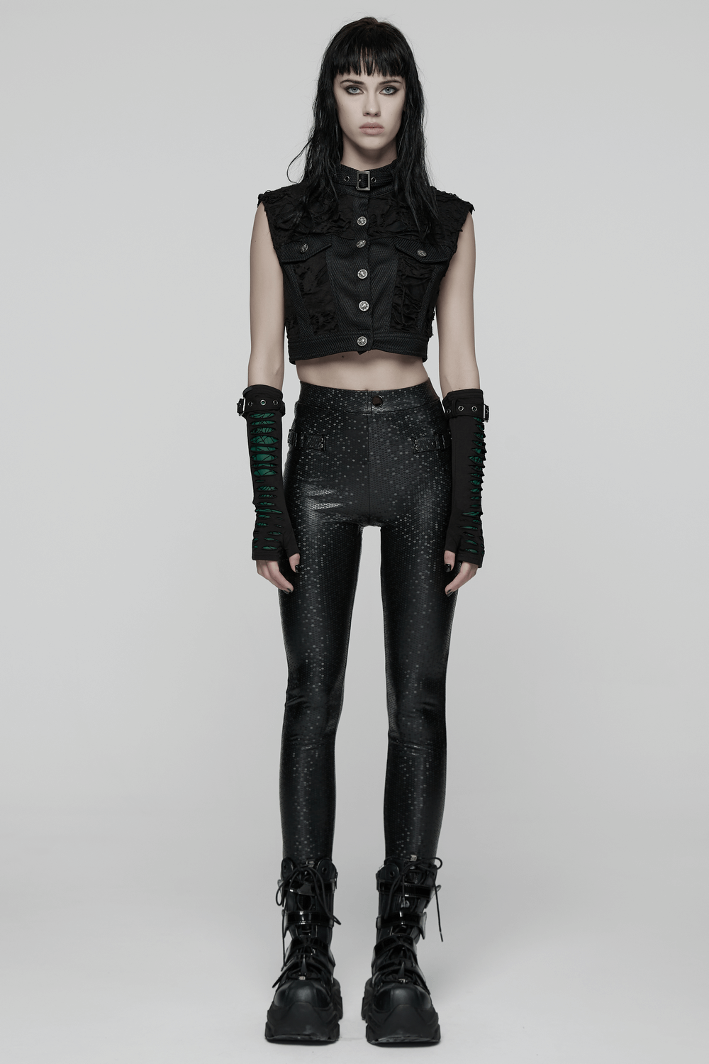 Goth Leggings with Stretch Fabric and Buckle Straps Pockets worn by a model with a punk style.