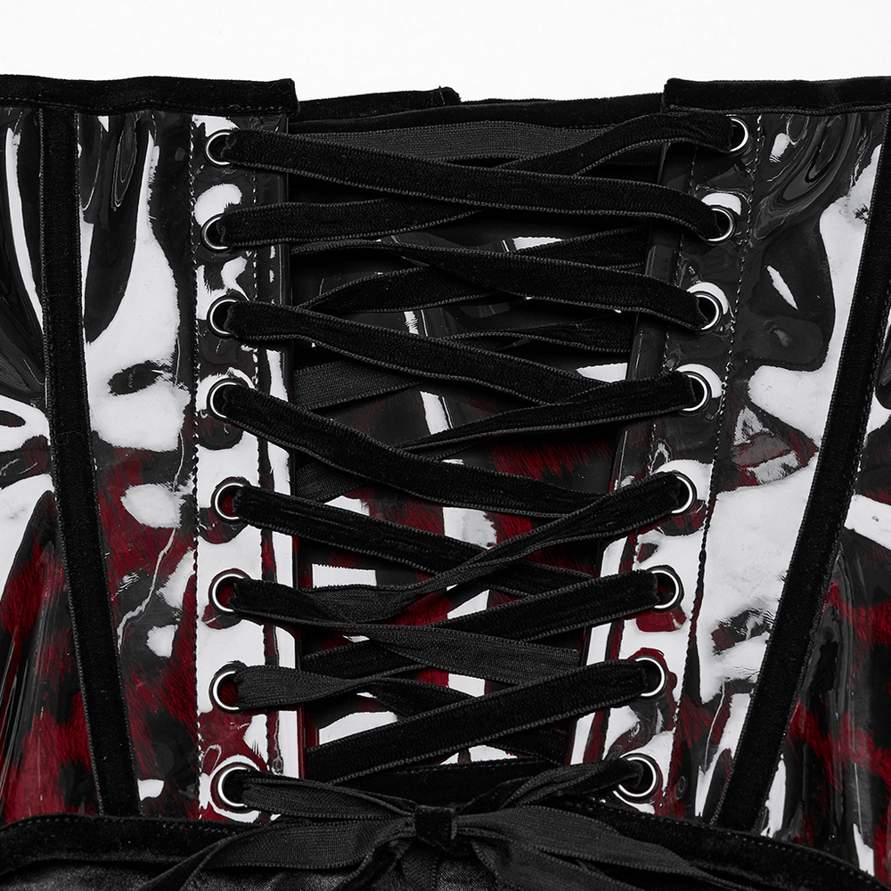 Close-up of goth leopard print patent leather corset with intricate lacing and adjustable drawstring detail.