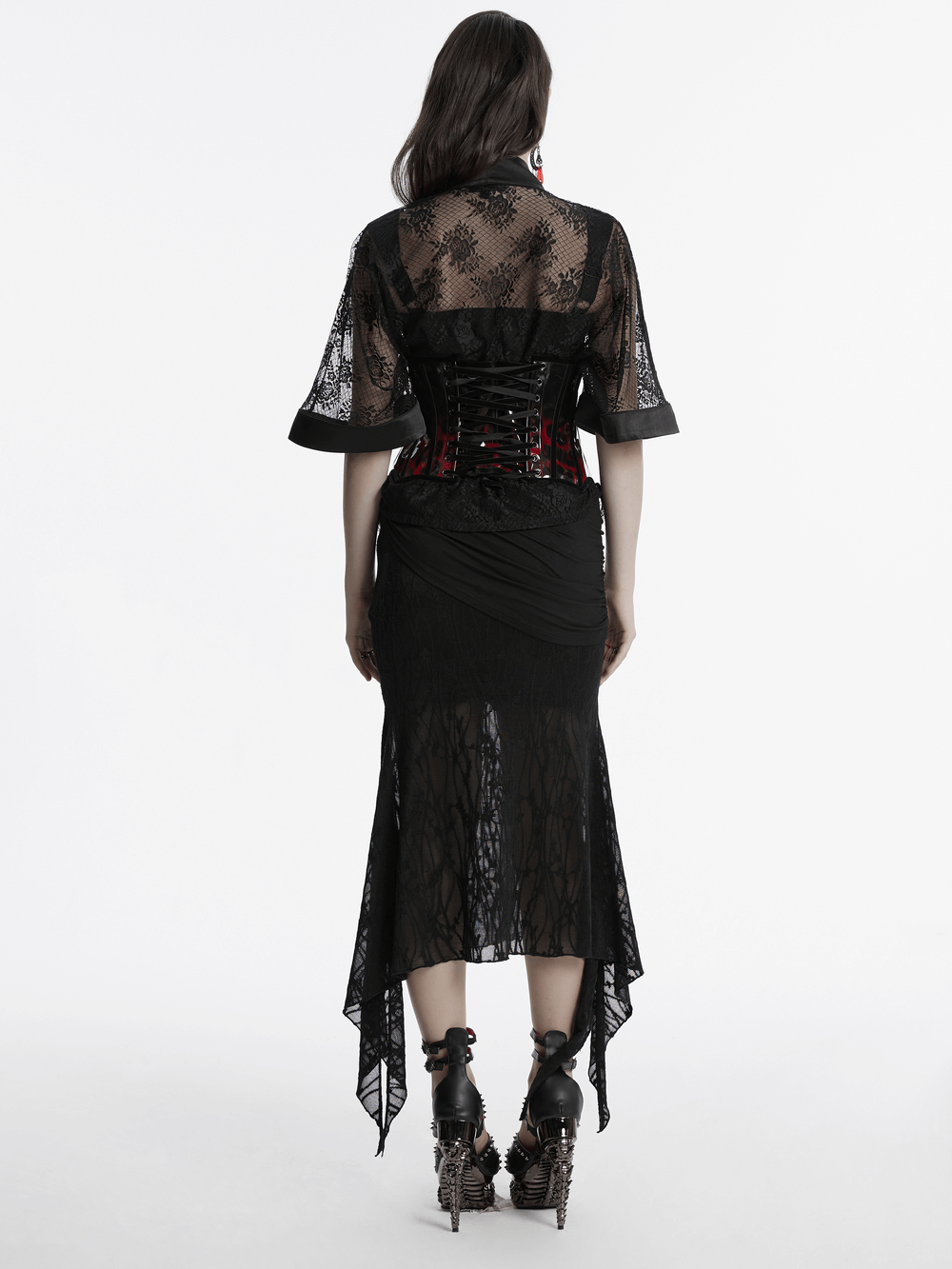 Back view of a model in a goth leopard print patent leather corset paired with a black lace skirt.