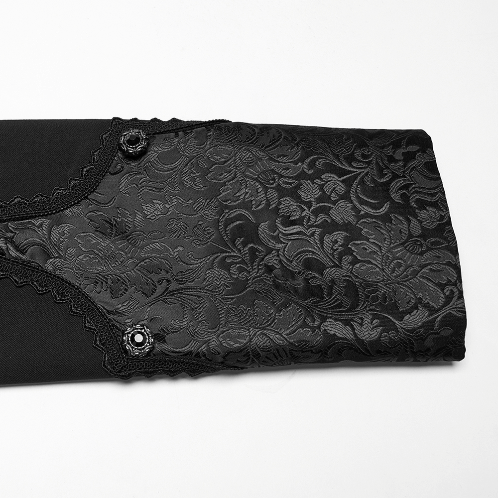 Close-up of a goth luxury gentleman's tuxedo sleeve featuring elegant jacquard design and stylish button detail.