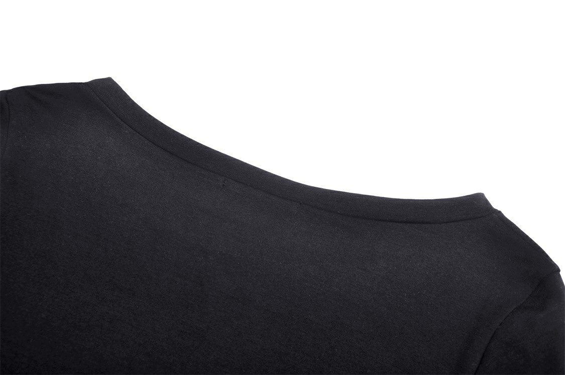 Close-up of the neckline of a black crop top, showcasing its soft fabric and stylish design.