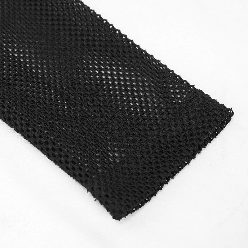 Close-up of black mesh fabric showcasing intricate pattern for gothic dress design.