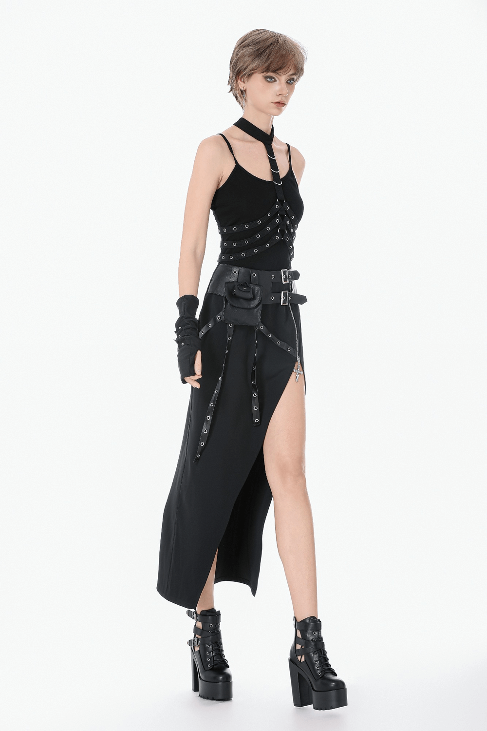 Goth Punk Strappy Chest Harness with Metal Eyelets worn over a stylish black outfit featuring a slit skirt and bold accessories.