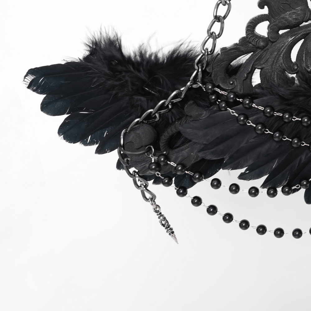 Alt Tag: Goth Raven Cross Staff with Roses and Beaded Chains close-up of black raven wings with beaded chains and dangling metal charm
