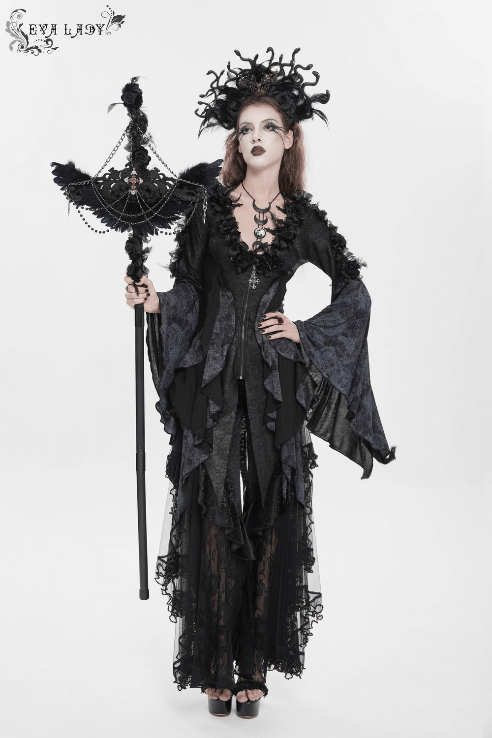 Alt Tag: Goth Raven Cross Staff with Roses and Beaded Chains held by gothic model in black lace dress, raven wings, cross, roses and beaded chains