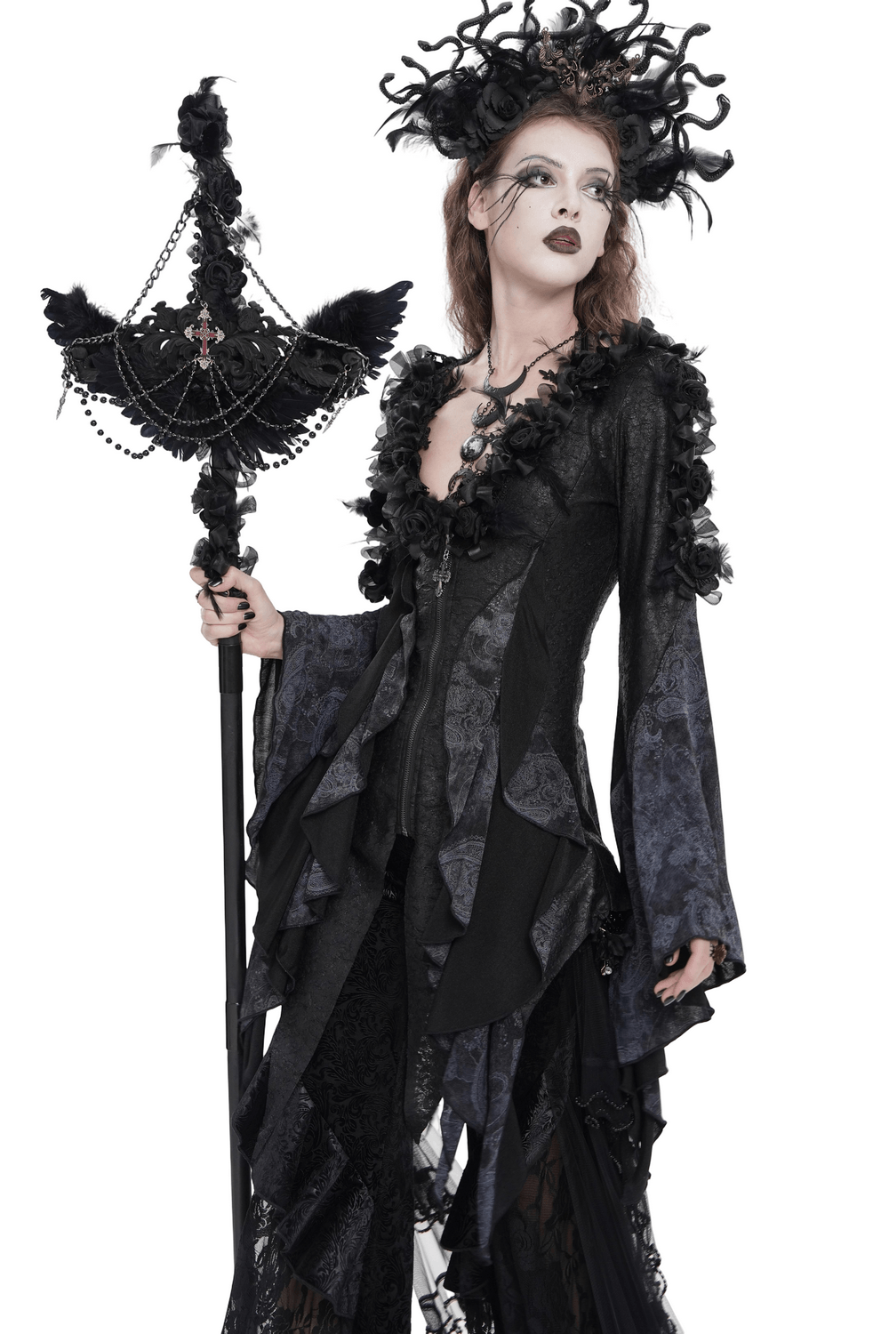 Alt Tag: Goth Raven Cross Staff with Roses and Beaded Chains held by goth model in black lace dress, wings, roses, and beaded chains prop