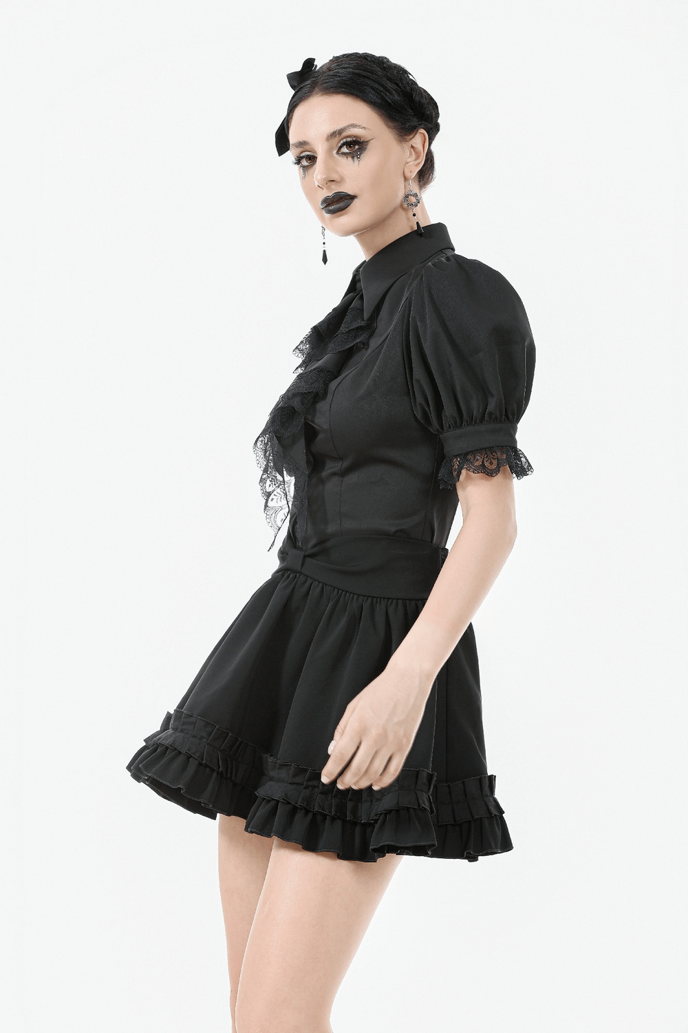Gothic Victorian-inspired black satin blouse with puff sleeves and ruffles, perfect for edgy fashion enthusiasts.
